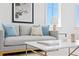 Bright living room features modern decor, plush seating, and a stylish coffee table at 6189 Leeland S St, St Petersburg, FL 33715