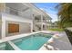 Beautiful pool with elegant architectural details, offering a luxurious outdoor space at 6189 Leeland S St, St Petersburg, FL 33715