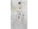 Luxurious walk-in shower with herringbone tile, dual shower heads, and glass enclosure at 6189 Leeland S St, St Petersburg, FL 33715