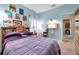 Charming bedroom with light walls and plenty of natural light at 8109 Madrid Rd, Spring Hill, FL 34613