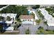 Aerial view of condo community, showcasing building and parking at 930 Virginia St # 201, Dunedin, FL 34698