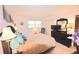 Bedroom with a double bed and ample closet space at 930 Virginia St # 201, Dunedin, FL 34698