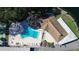 Aerial view of community pool and clubhouse at 930 Virginia St # 201, Dunedin, FL 34698