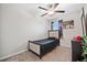 Cozy bedroom with a twin-size bed and large window at 9709 Pembrooke Pines Dr, Sun City Center, FL 33573