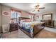 King-size bed, large windows and plenty of closet space at 9709 Pembrooke Pines Dr, Sun City Center, FL 33573