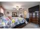 Bright bedroom with a king-size bed and en-suite bathroom at 9709 Pembrooke Pines Dr, Sun City Center, FL 33573