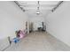 Attached garage with ample storage space at 9709 Pembrooke Pines Dr, Sun City Center, FL 33573