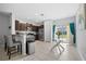 Modern kitchen with stainless steel appliances and granite countertops at 9709 Pembrooke Pines Dr, Sun City Center, FL 33573