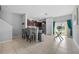 Modern kitchen with stainless steel appliances and breakfast bar at 9709 Pembrooke Pines Dr, Sun City Center, FL 33573