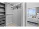 Large closet with shelves and hanging space at 100 Pierce St # 1210, Clearwater, FL 33756