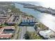 Aerial view showing building, pool, tennis court at 10216 Regal Dr # 603, Largo, FL 33774