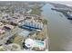Aerial view showing building, pool, tennis court at 10216 Regal Dr # 603, Largo, FL 33774