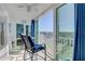 Balcony with outdoor seating and stunning water views at 10216 Regal Dr # 603, Largo, FL 33774