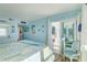 Bedroom with sliding glass doors leading to a balcony at 10216 Regal Dr # 603, Largo, FL 33774
