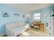 Home office with a comfortable sofa and wooden desk at 10216 Regal Dr # 603, Largo, FL 33774