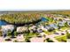 Property location shown from an aerial perspective, highlighting its waterfront setting at 10511 Martinique Isle Dr, Tampa, FL 33647