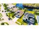 Aerial view of a lakefront house and neighborhood at 10511 Martinique Isle Dr, Tampa, FL 33647