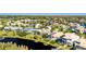 Property location shown from an aerial perspective, highlighting its waterfront setting at 10511 Martinique Isle Dr, Tampa, FL 33647
