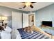 Bedroom with a large closet and ensuite bathroom at 10511 Martinique Isle Dr, Tampa, FL 33647