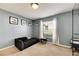 Spacious bedroom with a window and built-in shelving at 10511 Martinique Isle Dr, Tampa, FL 33647