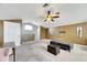Spacious bonus room with ceiling fan and window at 10511 Martinique Isle Dr, Tampa, FL 33647