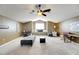 Bright bonus room featuring a window seat and ceiling fan at 10511 Martinique Isle Dr, Tampa, FL 33647