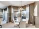Bright breakfast nook with glass table and chairs, lots of natural light at 10511 Martinique Isle Dr, Tampa, FL 33647