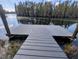 Private dock offering serene lake views, perfect for relaxing or enjoying water activities at 10511 Martinique Isle Dr, Tampa, FL 33647