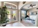 Spacious entryway with double doors and view into living room at 10511 Martinique Isle Dr, Tampa, FL 33647