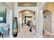 Elegant entryway with high ceilings and a view of living room at 10511 Martinique Isle Dr, Tampa, FL 33647