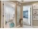 Hallway with access to bathroom and bedroom at 10511 Martinique Isle Dr, Tampa, FL 33647