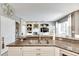 Kitchen island with granite countertop and double sink, offering ample workspace at 10511 Martinique Isle Dr, Tampa, FL 33647