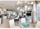 Open concept kitchen with a breakfast nook and views into the living room at 10511 Martinique Isle Dr, Tampa, FL 33647
