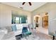 Bright living room features a comfy sectional sofa and large artwork at 10511 Martinique Isle Dr, Tampa, FL 33647