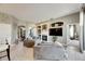 Living room with a fireplace and built-in shelving at 10511 Martinique Isle Dr, Tampa, FL 33647