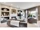 Spacious living room features a fireplace and built-in shelving, creating a cozy atmosphere at 10511 Martinique Isle Dr, Tampa, FL 33647