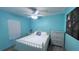 Cozy bedroom featuring a comfortable bed, dresser, and ceiling fan at 1515 Pinellas Bayway S # 35, Tierra Verde, FL 33715