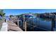 Private boat dock with lift for easy access to the water at 1515 Pinellas Bayway S # 35, Tierra Verde, FL 33715