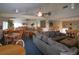 Relaxing community room with seating and a pool table at 1515 Pinellas Bayway S # 35, Tierra Verde, FL 33715