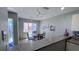 Bright dining area with glass table and chairs, offering a view to the outside at 1515 Pinellas Bayway S # 35, Tierra Verde, FL 33715