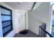Condo entryway with door and small balcony at 1515 Pinellas Bayway S # 35, Tierra Verde, FL 33715