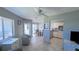 Open concept living room, dining, and kitchen area at 1515 Pinellas Bayway S # 35, Tierra Verde, FL 33715