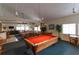 Community room features a pool table for entertainment at 1515 Pinellas Bayway S # 35, Tierra Verde, FL 33715