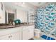 Bathroom with double vanity and shower/tub combo at 2101 Sunset Wind Loop, Oldsmar, FL 34677