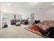 Spacious bonus room featuring a comfortable seating area and large windows at 2101 Sunset Wind Loop, Oldsmar, FL 34677