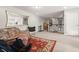 Bright bonus room with a futon, large mirror, and access to upper hallway at 2101 Sunset Wind Loop, Oldsmar, FL 34677