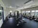 Well-equipped fitness center with various exercise machines at 2101 Sunset Wind Loop, Oldsmar, FL 34677