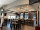 Clubhouse bar with seating and large windows at 2122 Hereford Dr # 511, Sun City Center, FL 33573