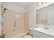 Bathroom with tub and white vanity at 2122 Hereford Dr # 511, Sun City Center, FL 33573