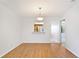 Simple dining area with light walls and wood-look flooring at 2122 Hereford Dr # 511, Sun City Center, FL 33573